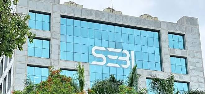 SEBI building in Mumbai with headline about Vinod Adani case being dropped