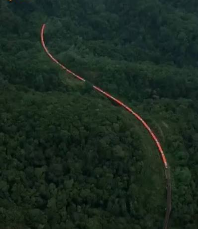 Vande Bharat Looks Like an Orange Snake as It Cuts Through Karnataka’s Misty Western Ghats